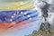stratovolcano blast eruption at day time with white smoke on Venezuela flag background, problems of natural disaster and volcanic