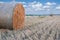 Straw bale hay stack on golden sunny day