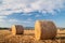 Straw bales and blue sky