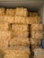 Straw bales stacked in cargo container