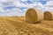 Straw bales stacked in a field at summertime, Reims , France