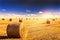 Straw bales and sunset