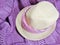 Straw Fedora with Pink Bandanna on Purple Knit Sweater