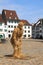 Straw figure showing emotional gestures on the Munster Square, Basel