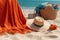 A straw hat and bag with a rug left on the sand.