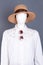 Straw hat and fashion design female blouse.