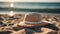 Straw hat on the sand beach.