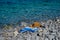 Straw hat, sunglasses, towel on a background seascape