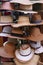 straw hats assortment on the Spanish outdoor shop closeup photo