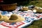 Straw Hats and Picnic Basket on Quilt