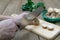 Straw mushroom cutting on a wooden cutting board