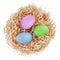 Straw nest filled with white eggs, top view isolated on white background. Happy Easter decorations, template for tag, gift