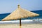 Straw parasol on the beach