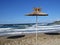 Straw Parasol Umbrella on Sandy Beach During Exotic Vacation