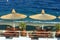 Straw parasols on beach