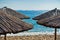 Straw parasols on a beach in Sithonia