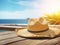 Straw sombrero hat lying on sunlit wooden deck with sea in the background. Generative AI