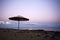 Straw sunshade at Lanzarote beach in moonlight