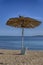 Straw umbrella at the seaside