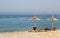 Straw umbrellas on the beach