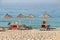 Straw umbrellas on the beach