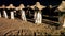 Straw Umbrellas On A Beach By Night