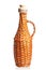 Straw wicker bottle for oil with cork