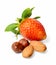 Strawberries, almonds and hazelnuts. Composition on a white isolated background. Close-up.