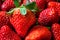 Strawberries background pile macro