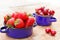 Strawberries and cherries in rustic pots