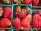 Strawberries displayed in baskets