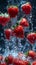 Strawberries floating in mid-air with water splashing, against a dark backdrop
