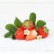 Strawberries fruits strawberry leaves square on wooden board