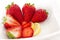 Strawberries and Lemmon on white plate