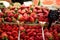 Strawberries on markets stall with price on a plate