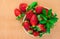 Strawberries. Organic Closeup with mint, natural non GMO rustic