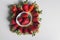 Strawberries over natural wooden background. Top view, copy space