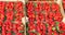 strawberries for sale in the greengrocer stall at the local market