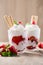 Strawberries sliced with whipped cream