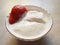 Strawberries in sour cream. Ripe strawberry berry with strawberries. Delicious delicacy.