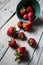 Strawberries spilling out of a bowl