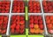 Strawberries in transparent boxes for sale