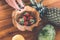 Strawberries in a wooden teak bowl. Indonesian teak bowl.