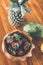 Strawberries in a wooden teak bowl. Indonesian teak bowl.