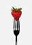 Strawberry on black fork