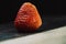 strawberry on a black and white wooden background close-up