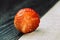 strawberry on a black and white wooden background close-up