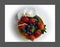 Strawberry and blueberry Desert With orchid on yellow plate