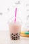 Strawberry Boba Bubble Tea with candy and crushed ice.