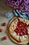 Strawberry cake with powder sugar and flowers